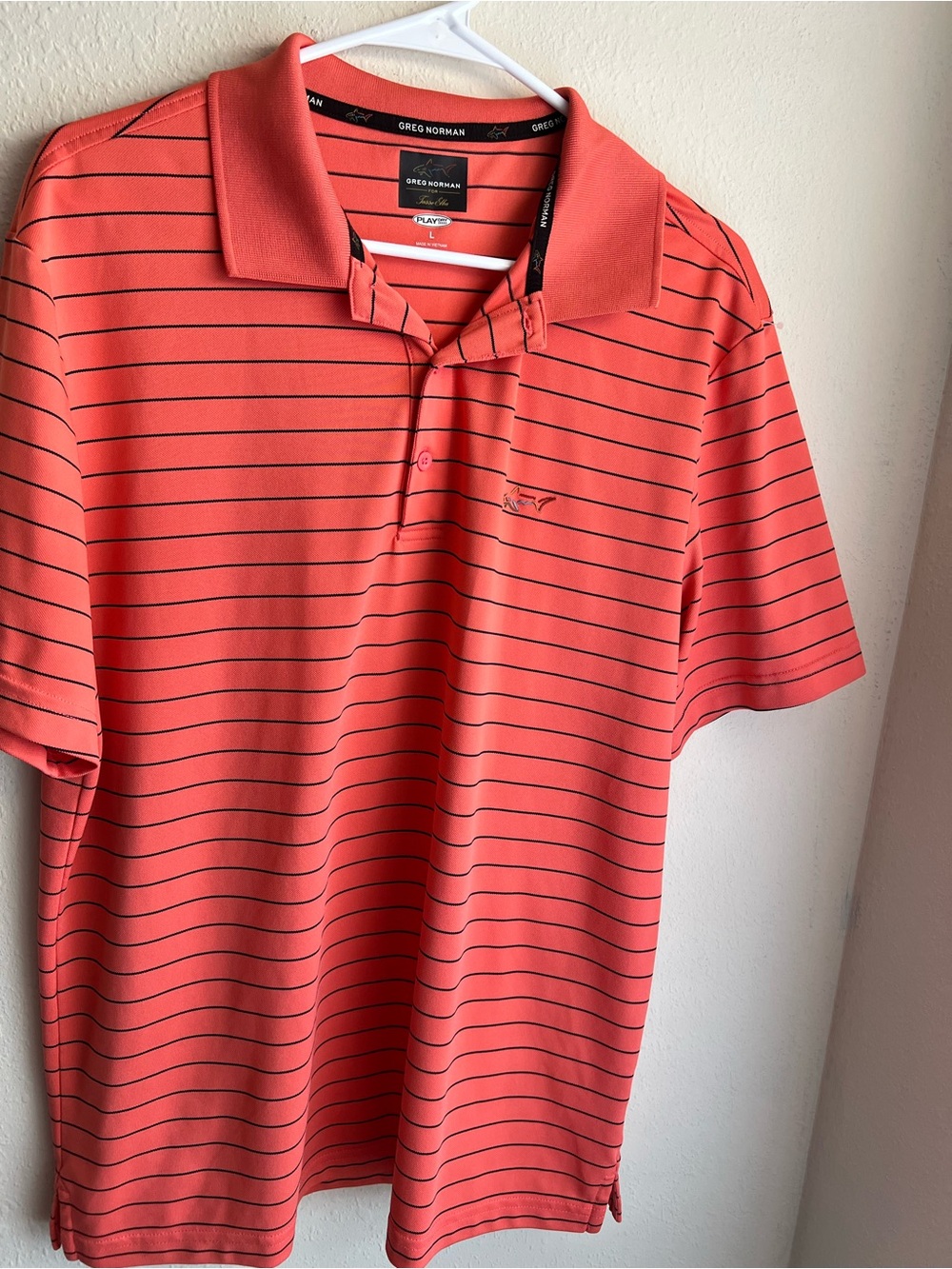 Greg norman  Coral Polo with Thin Black Stripes